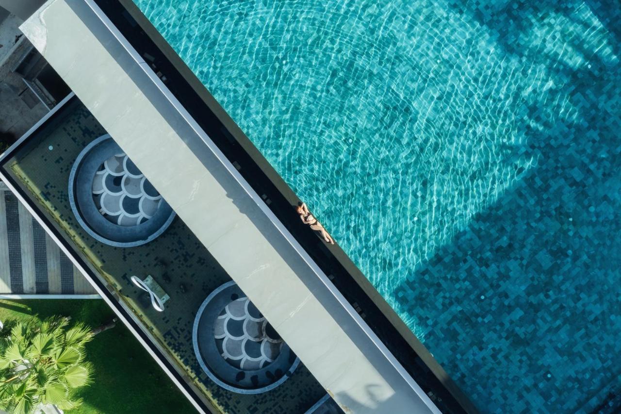 Oceanfront Beach Resort - Sha Extra Plus Patong Экстерьер фото A pool with a swim jet