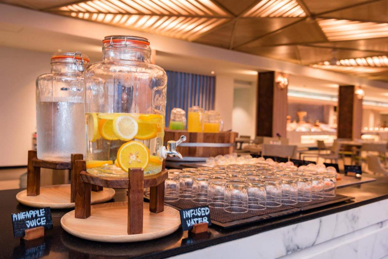 Oceanfront Beach Resort - Sha Extra Plus Patong Экстерьер фото Infused water at a buffet