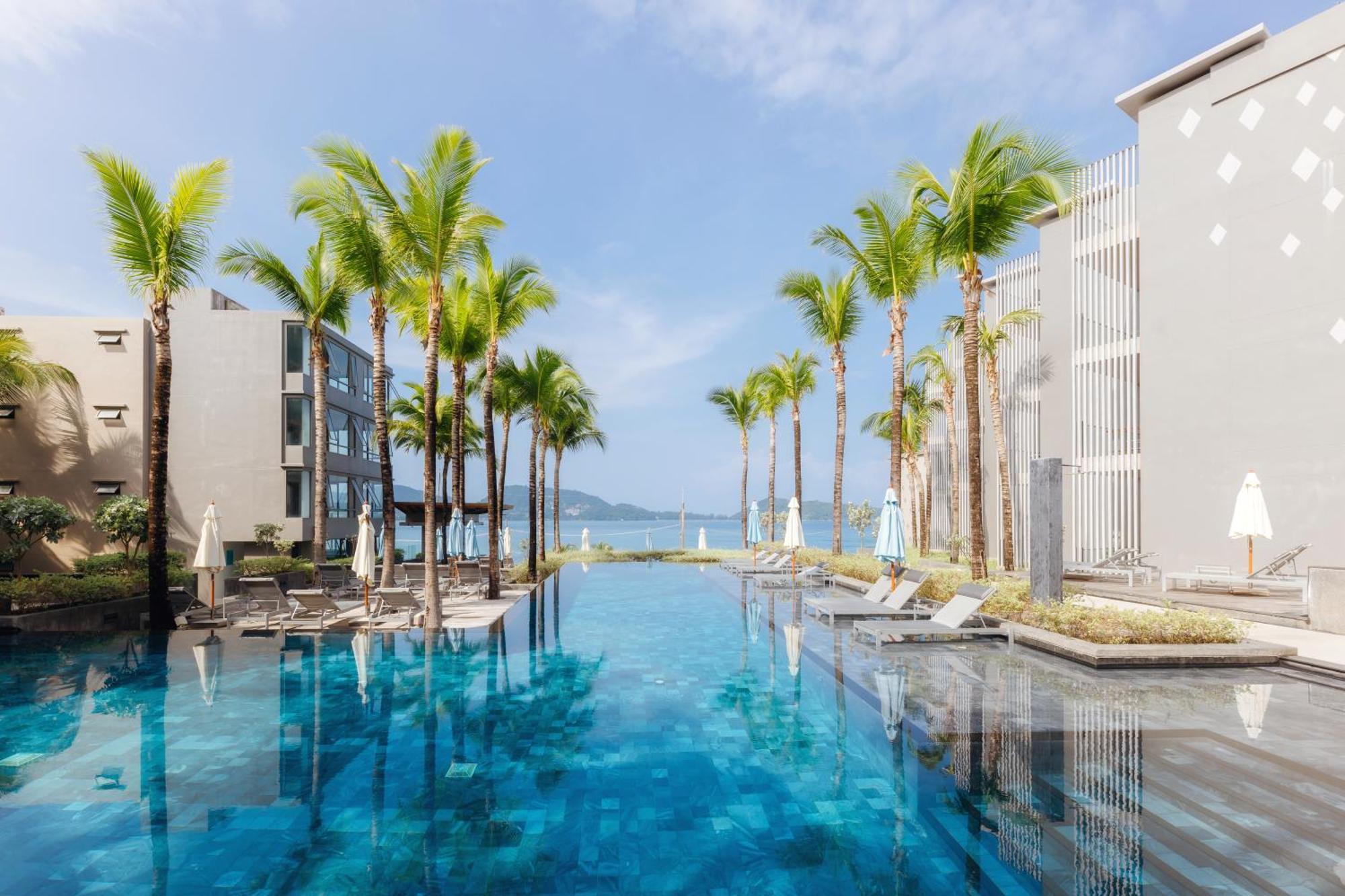 Oceanfront Beach Resort - Sha Extra Plus Patong Экстерьер фото The swimming pool at the hotel