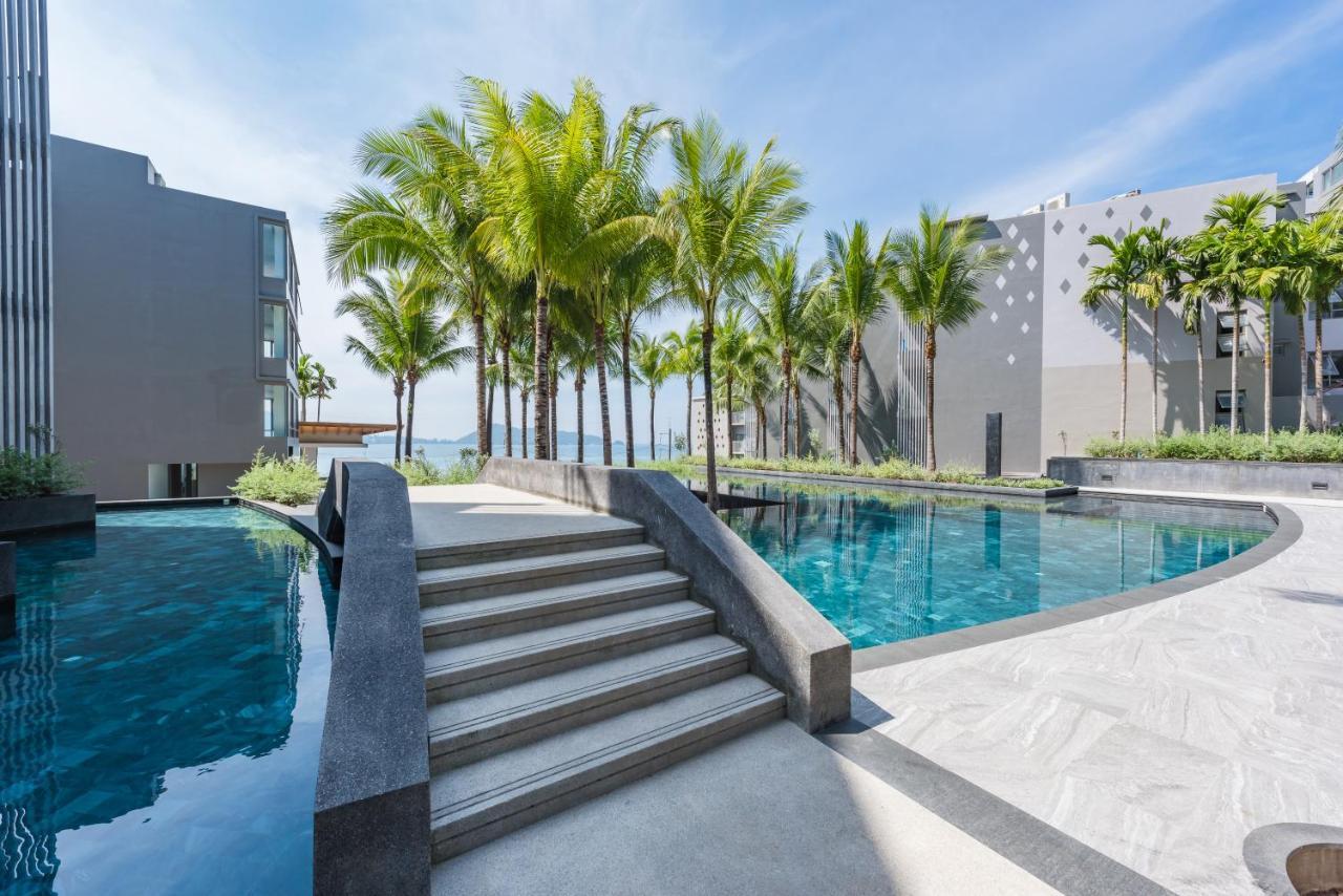 Oceanfront Beach Resort - Sha Extra Plus Patong Экстерьер фото The swimming pool at the resort