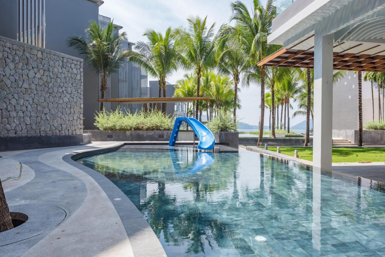 Oceanfront Beach Resort - Sha Extra Plus Patong Экстерьер фото The swimming pool at the resort